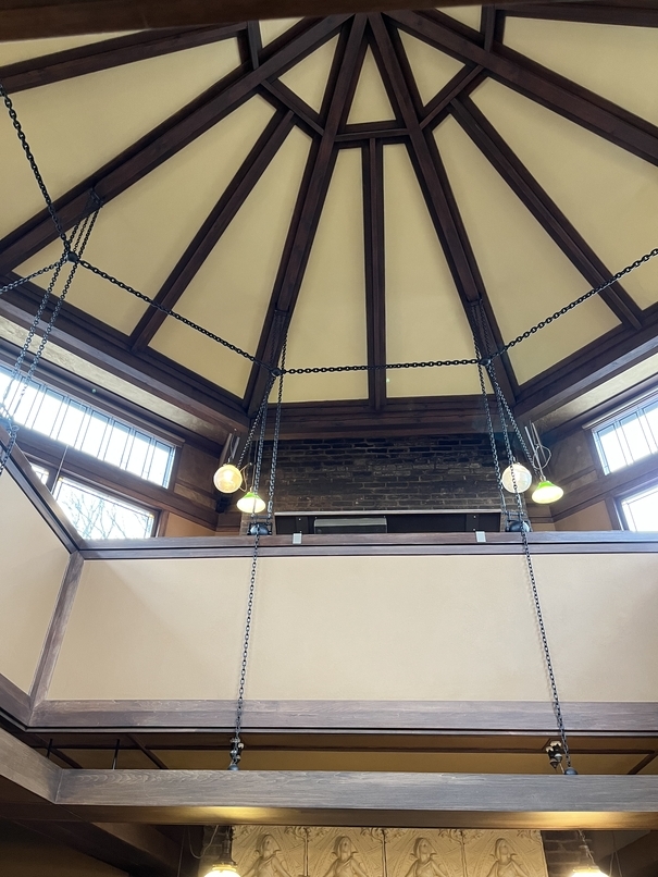 Part of Frank Lloyd Wright's new studio -- there's an octagon dome roof, chain supports, and lots of light.